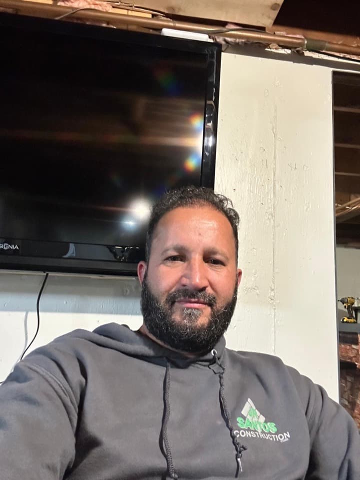 Josué Santos, owner of Jr Santos Construction Corp, on a jobsite in Bridgewater, MA